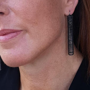 Black Tunnel Earrings